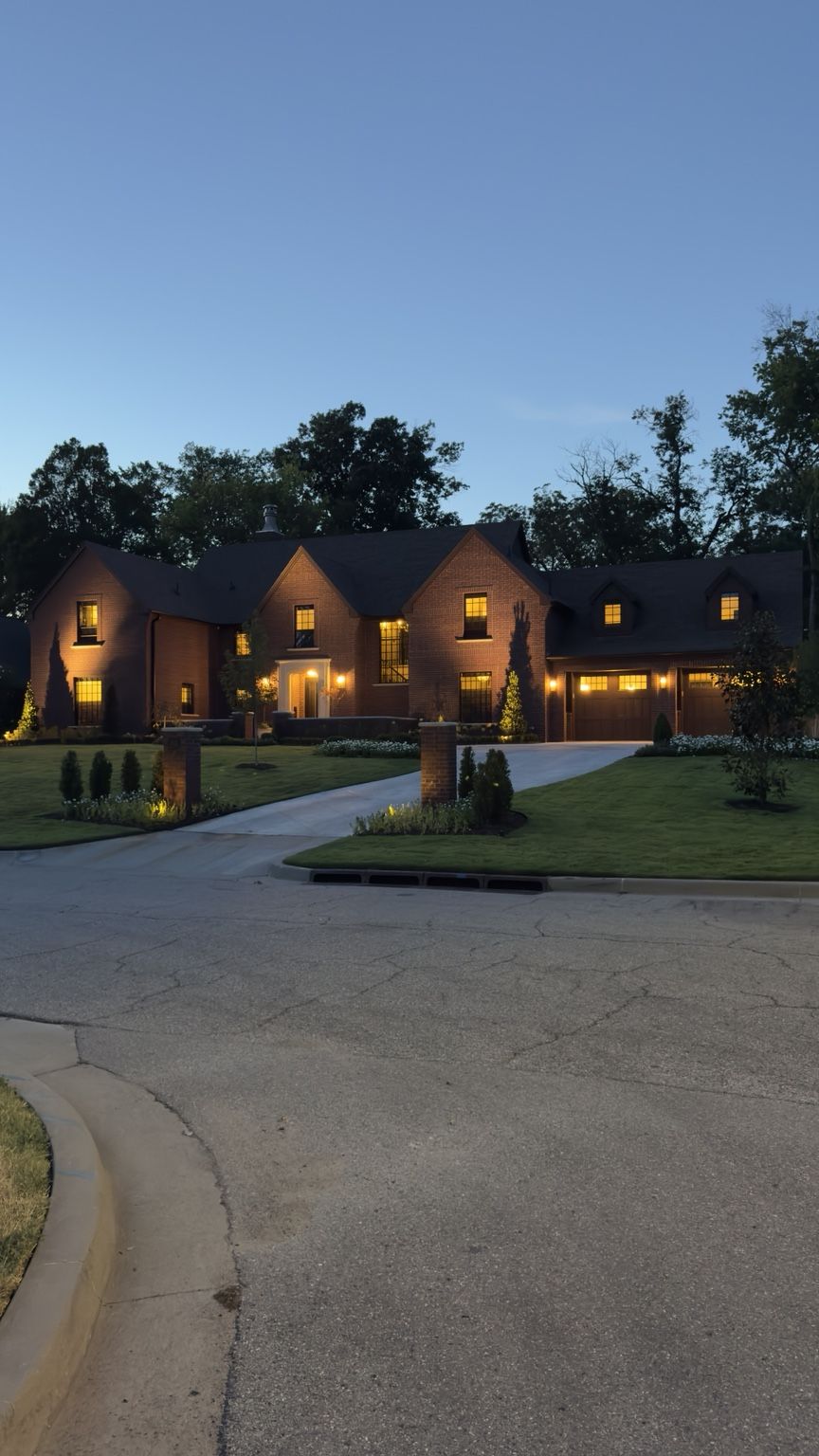 Tulsa Tudor residence at twilight